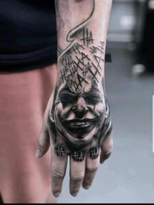 What Does The Joker Tattoo Meaning and English.